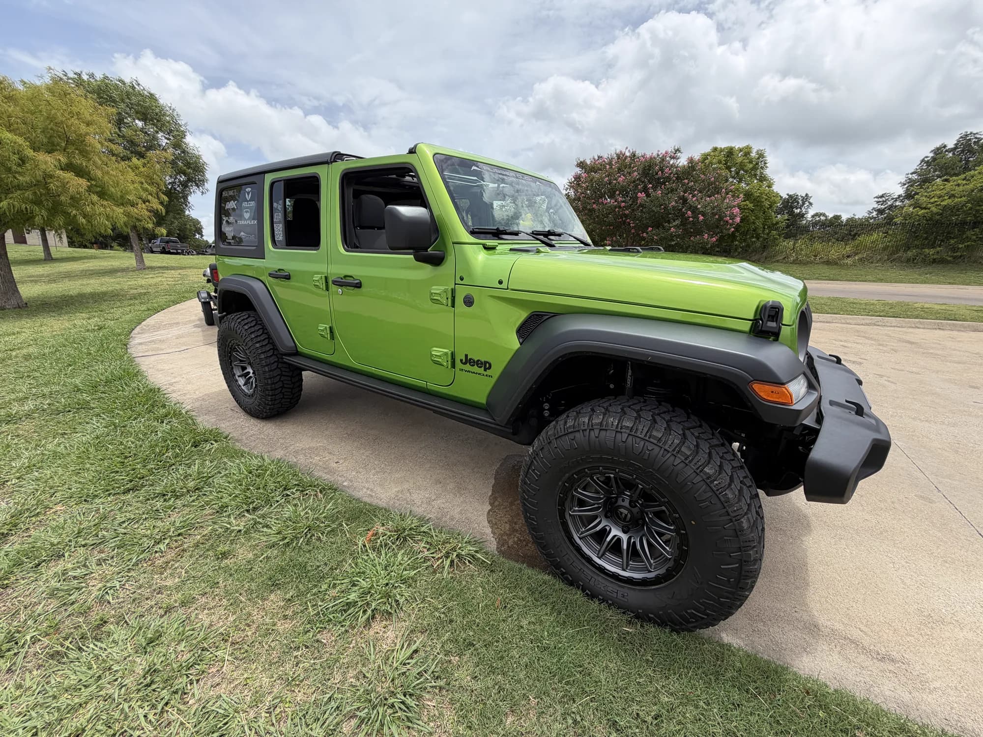 2026 Jeep Wrangler Sport 4x4 in Mojito Clear-Coat with off-road upgrades